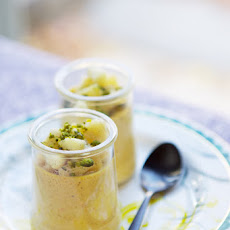 Spiced pumpkin pots de crème with sautéed apples and pistachios