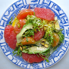 Mixed Citrus And Avocado On A Bed Of Frisee