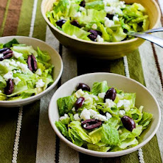 Mediterranean Salad with Hummus Dressing, Olives, Capers, and Feta