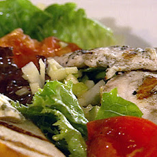 Opakapaka Fish on Hirabara Baby Greens, Green Apple Vinaigrette, and Stilton Bruschetta