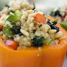 Stuffed Red Bell Peppers With Rice, Pine Nuts and Currants