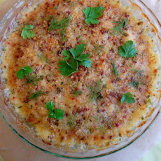 Bay Scallops, Shrimp and Calamari Gratin, Flavored with Mortadella