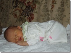 Amelia asleep on the couch