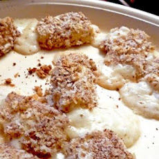 Warm Almond Crusted Manchego Cheese With Hot Garlic Vinaigrette
