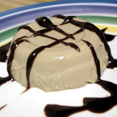 Costa Rican Coffee Panna Cotta with Bittersweet Chocolate-Rum Sauce