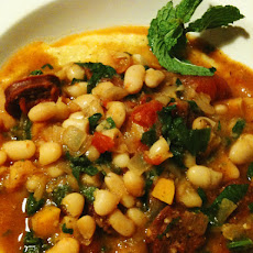 White Bean Lamb Kielbasa Stew over Polenta