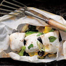Fish in Parchment with Zucchini, Black Olives and Basil Recipe