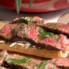 Mini Open Faced Steak Sandwiches on Garlic Bread with Aged Provolone and Parsley Oil