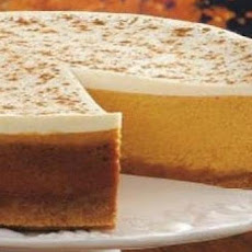 Pumpkin Cheesecake with Marshmallow-Sour Cream Topping and Gingersnap Crust