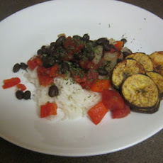 No Fail Black Beans and Rice Garnished With Crispy baked Plantain Chips
