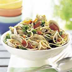 Grilled Clams with Spaghetti, Prosciutto, and Mixed Greens