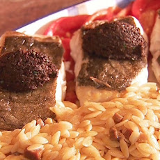 Oven-Roasted Halibut with Black Olive Tapenade on Roasted Red Peppers (Rape Asado con Tapenada Negra Y Pimientos Morrones)