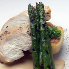 Breast of Chicken on Pumpkin/Cranberry Rissole with White Chocolate Balsamic Sauce and Asparagus