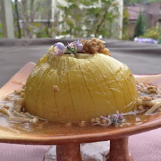 Allium On A Pedestal with Beef Enoki Sauce and Rosemary Flowers