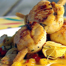 Sugarcane Skewered Sea Scallops with Mango Hearts of Palm Slaw and Scotch Bonnet Sugarcane Syrup