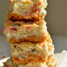 Loaded Cream Cheese Cookie Bars with Animal Cookie Crust