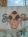 Graffiti Cara con Fluidos Morados 