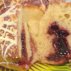 Pacific Northwest Blackberry Filled Doughnuts with White Chocolate Ganache and Toasted Hazelnuts