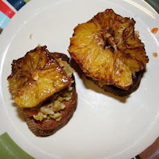 Crostini Topped with Balsamic-Simmered Oranges and Crushed Olives