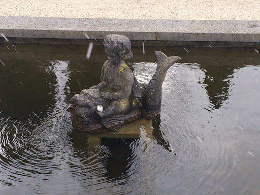 Statue of a Boy on a Fish