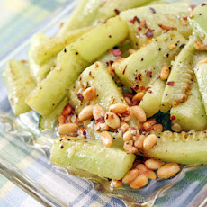 Brown butter braised cucumbers with pine nuts and coarse salt