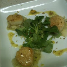 Seared Scallops With Melted Leeks and Pistachio Vinaigrette