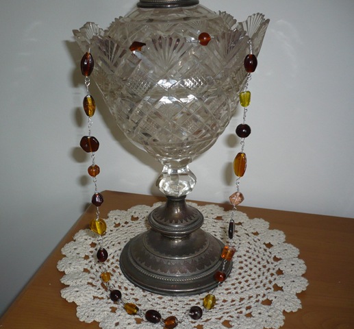 [Necklace draped over antique close up[6].jpg]