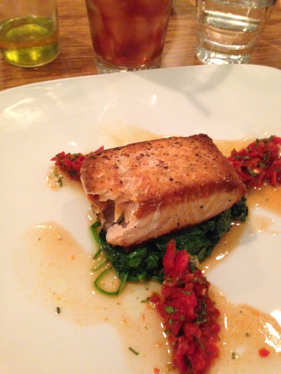 Salmon with baby spinach and tapenade