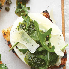 Mozzarella, Pesto, Arugula, and Parmesan Bruschetta