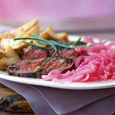 Shallot-Rubbed Steak with Roasted Potatoes and Pickled Onions