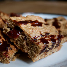 Gooey cardamom, dark chocolate and cranberry blondies