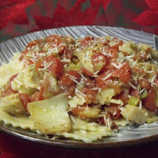 Cheese Ravioli With Fresh Tomato and Artichoke Sauce