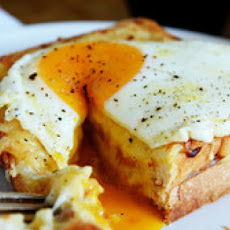 Croque Madame - French-style toasted ham and cheese topped with a fried egg