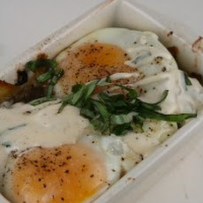 Baked Eggs with Mushrooms, Leeks, Parmesan, and Bechamel