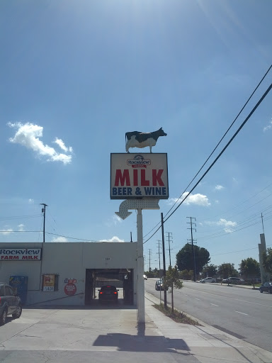 Rockview Drive Through Dairy Balancing Cow Statue 