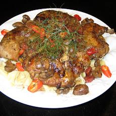 Chicken Braised in Virginia Spiced Wine with Shallots & Crimini Mushrooms over Noodles