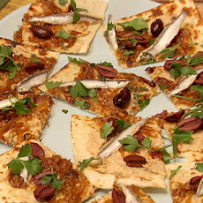 Flatbread with White Bean Hummus, Caramelized Onions, Black Olives and Spanish White Anchovies
