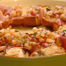 Prosciutto-Wrapped Crostini with Melon Salsa Crudo