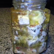 Marinated Feta Cheese With Orange, Green Olives, and Garlic