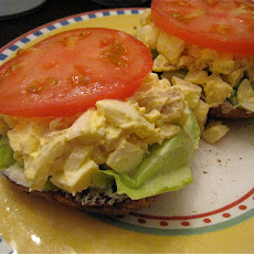 Smoked Trout, Egg, and Onion Salad on a Toasty Bagel