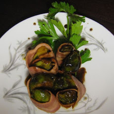 Turkey Bacon Wrapped Seared Brussels Sprouts with a Red Wine Reduction