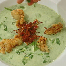 Oyster Rockefeller Soup garnished with Crispy Bacon and Fried Oysters