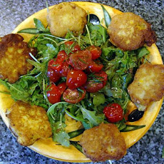 corn fritters w/arugula and warm tomatoes