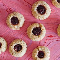 Peanut Butter and Jelly Thumbprint Cookies Rolled in Crushed Potato Chips