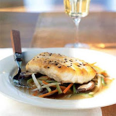 Striped Bass Fillet with Lobster Stock and Aromatic Vegetables