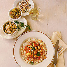 Couscous with Spiced Red Sauce, Chickpeas, and Almonds