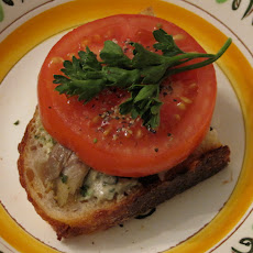 Slice of Summer Tomato Sandwich with Smoked Fish and Basil-Mascarpone