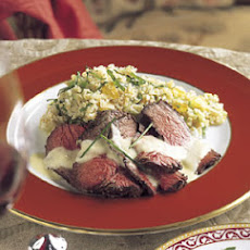 Grilled Beef Tenderloin with Roasted Garlic Sauce and Leek-Tomato Quinoa