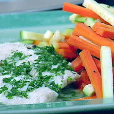 Sea Bass Poached in a Court Bouillon with Sauteed Batonnet of Carrots and Zucchini