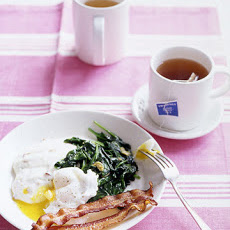 Poached Eggs with Bacon Grits and Wilted Spinach